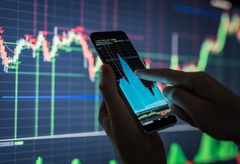 川普旋風席捲金融市場 台股指標過熱、隨台積電回檔暫歇